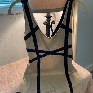 Black and tan sleeveless blouse